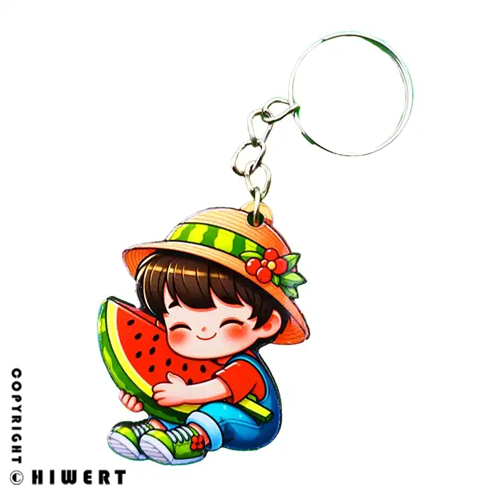 جاکلیدی چوبی طرح پسر هندوانه‌ ای با کلاه حصیری مخصوص شب یلدا